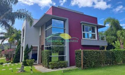 Linda casa de alvenaria de dois pavimentos no Condomínio Jardim Ribeirão I - Ribeirão da Ilha - Flo