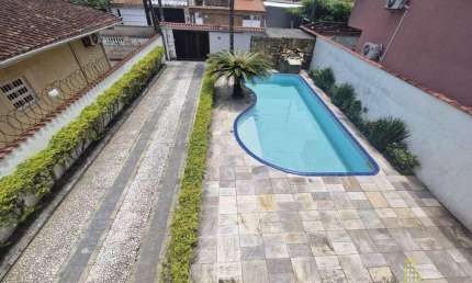 Sobrado com 4 dormitórios à venda, 140 m² por R$ 894.000 - Jardim Helena Maria - Guarujá/SP