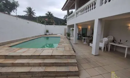 Sobrado com 4 dormitórios à venda, 273 m² por R$ 1.400.000,00 - Guaiuba - Guarujá/SP
