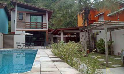 Casa com 3 suítes à venda, 158 m² por R$ 1.120.000,00 - Guaiuba - Guarujá/SP