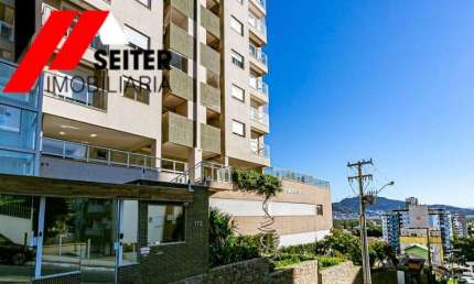 apartamento de 2 dormitorios suite sacada com churrasqueira e 2 vagas de garagem coberta
