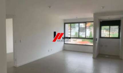 Apartamento de dois dormitórios com suite à venda na Carvoeira em Florianópolis