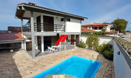 Casa duplex com 400m² 4 dormitórios no bairro itaguaçu