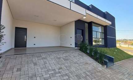 LINDISSIMA CASA EM CONDOMINIO FECHADO, PAREDE DE VIDRO NA SALA, ARMARIOS PLANEJADOS EM TODOS OS AMBIENTES, AR CONDICIONADO, JARDIM.