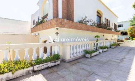 Casa c/ 3 quartos, 1 suíte e 3 vagas, 350m², à venda no bairro Vila Guilhermina, por 1.800.000,00