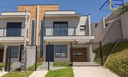 Sobrado com 3 dormitórios à venda, 104 m² por R$ 690.000,00 - Atuba - Curitiba/PR