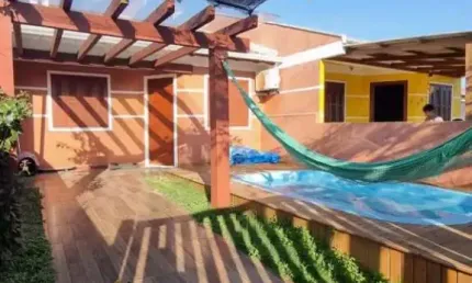 BELA CASA GEMINADA COM PISCINA, MOBILIADA EM NOVA TRAMANDAÍ