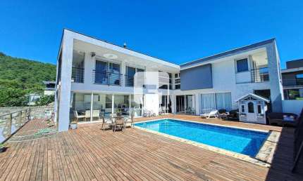 Casa em condomínio fechado com 4 quartos para alugar na Rodovia Admar Gonzaga, 3180, Itacorubi, Florianópolis