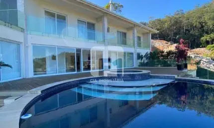 Casa em condomínio fechado com 5 quartos para alugar na Rodovia Haroldo Soares Glavan, 4450, Cacupé, Florianópolis
