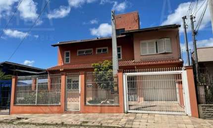 Casa com 4 quartos à venda na Rua Salvador, Jardim América, Caxias do Sul, 288 m2 por R$ 1.100.000