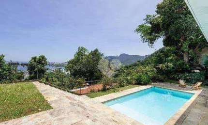 Raridade!! Prêmio de Arquitetura!! A melhor casa do Bairro, com 5 quartos, piscina , suites, Salões, 900m2 de area construida.
