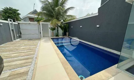 Maravilhosa casa com 4 suítes com lazer privativo em condomínio clube.