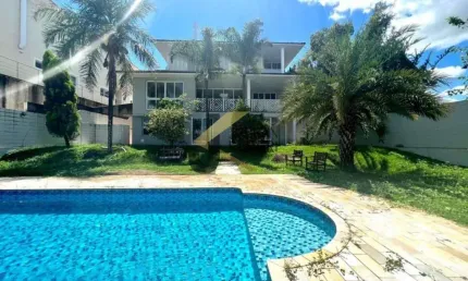 Casa à venda no condomínio Alphaville Campinas, 5 dormitórios (4 suítes), piscina e garagem para vários carros