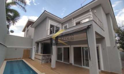 Casa em condomínio para alugar no Parque dos Resedás - Campinas, com 04 suítes ( 1 máster) living 03 ambientes , piscina e churrasqueira, 6  garagem