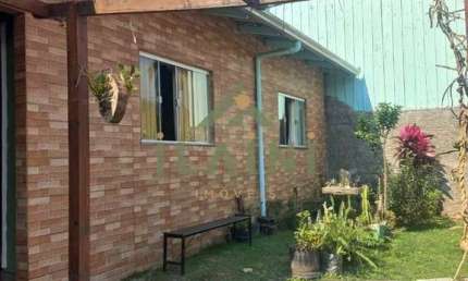 Casa térrea Com 3 dormitórios localizado no bairro Rio Pqueno Camboriú!