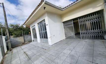Terreno de 300m² e 3 casas, sendo 1 comercial no Balneário do Estreito