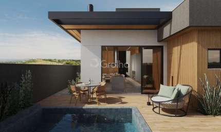 Alto Padrão na Pedra Branca - Casa Térrea com Piscina, 3 Suítes e Energia Solar