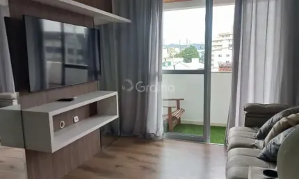 Apartamento de 65m² com 2 quartos sendo 1 suíte no bairro Pagani em Palhoça/SC