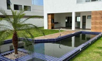 Vendo Casa nova recém construída com 50mm2, piscina privativa, espaço gourmet , área verde, jardim, 4 suítes no condomínio Parque de Jacuípe com Rio e mar para ir andando.