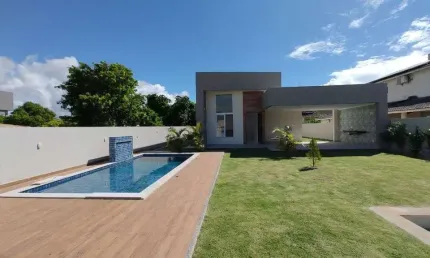Casa com 3 dormitórios à venda, 157 m² por R$ 990.000,00 - Barra do Jacuípe - Camaçari/BA