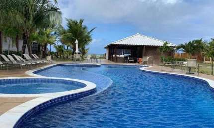 Village 3 suítes em Condomínio Pé na Areia,  na praia de Itacimirim
