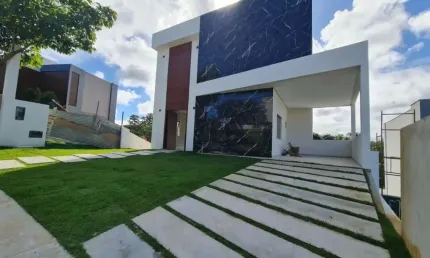 Venha se encantar com esta magnífica residência no Alphaville Litoral Norte 2.