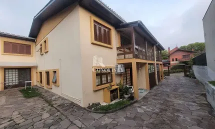 Casa com 3 quartos à venda na Rua Arthur Azevedo, 41, Jardim América, Caxias do Sul por R$ 460.000