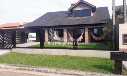 Casa com 3 quartos à venda na Santa Catarina , Baia, avenida Passo Fundo e Santa Maria, 7, Praia Paraíso, Torres por R$ 640.000