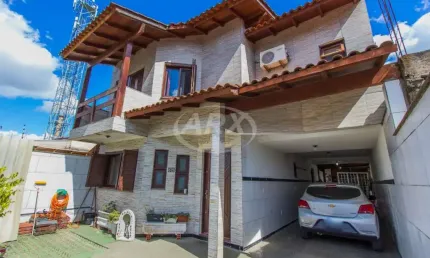 Casa com 3 quartos à venda na Rua Martinho Lutero, 88, Harmonia, Canoas por R$ 610.000