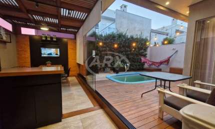 Casa com 3 quartos à venda na Rua Henrique Kranen Filho, 26, Estância Velha, Canoas por R$ 1.390.000