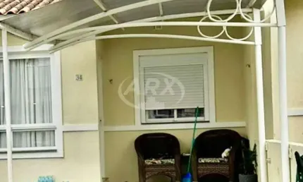 Casa em condomínio fechado com 2 quartos à venda na Rua Santa Júlia, 55, Olaria, Canoas por R$ 370.000