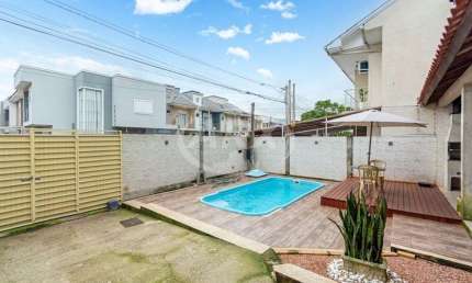 Casa com 3 quartos à venda na Erva Mate, 582, Igara, Canoas por R$ 440.000