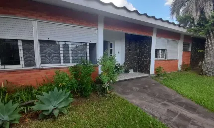 Casa com 4 quartos à venda na dos Gerânios, 20, Igara, Canoas por R$ 980.000