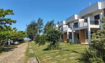Casa em condomínio fechado com 2 quartos à venda na 4, 44, Praia Real, Torres por R$ 325.000