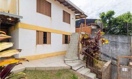 Casa com 5 quartos à venda na Rua Carlos Ribeiro da Silva, 199, Partenon, Porto Alegre por R$ 350.000