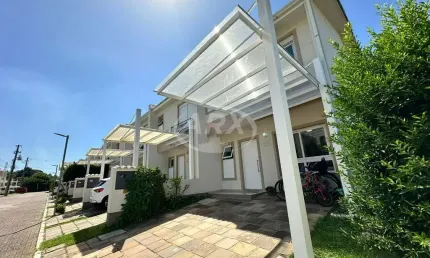 Casa em condomínio fechado com 3 quartos à venda na Avenida Armando Fajardo, 1977, Igara, Canoas por R$ 869.000
