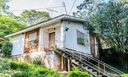 Casa em condomínio fechado com 3 quartos à venda na Acesso dos Guapuruvus, 111, Santa Tereza, Porto Alegre por R$ 315.000