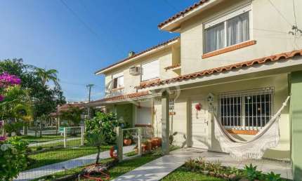 Casa em condomínio fechado com 2 quartos à venda na Beija Flor, 834, Capão Novo, Capão da Canoa por R$ 298.000