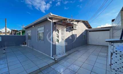 Casa em condomínio fechado com 2 quartos à venda na L Cinco, 13, Guajuviras, Canoas por R$ 350.000