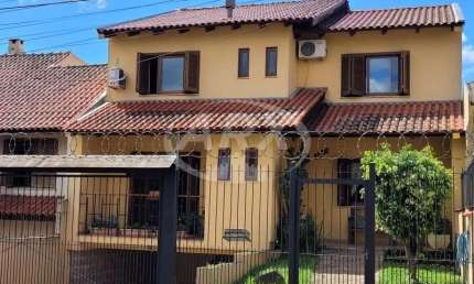Casa com 3 quartos à venda na Rua Doutor Mário Totta, 2812, Tristeza, Porto Alegre por R$ 870.000