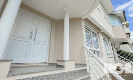 Casa com 4 quartos à venda na Rua Doutor Barbosa Gonçalves, 219, Chácara das Pedras, Porto Alegre por R$ 1.270.000