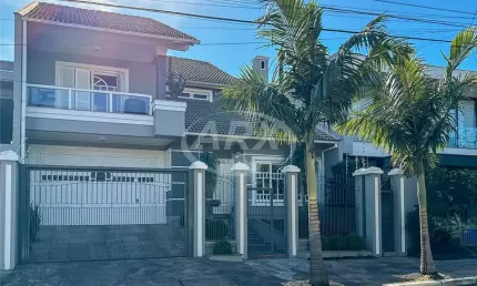 Casa com 3 quartos à venda na rua dinamarca, 286, marechal rondon, canoas por r$ 1.490.000