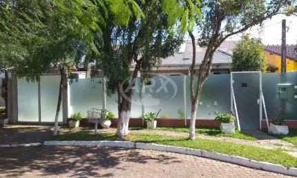 Casa com 4 quartos à venda na rua das palmas, 36, harmonia, canoas por r$ 420.000