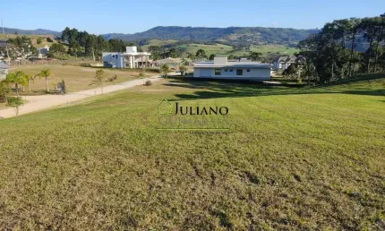 Terreno á venda no condomínio costa da serra - rancho queimado