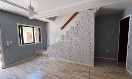 Casa em condomínio fechado com 2 quartos à venda na Rua Flávio Catanhede, 55, Vila Silveira Martins, Cachoeirinha, 99 m2 por R$ 279.900
