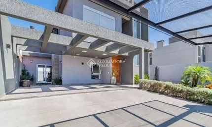 Casa com 3 quartos à venda na Avenida Bromélias, 456, Parque da Matriz, Gravataí, 180 m2 por R$ 1.350.000