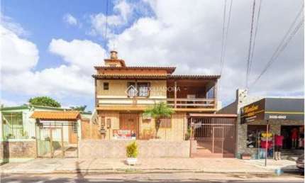 Casa com 4 quartos à venda na Juscelino Kubitschek de Oliveira, 579, Parque Granja Esperança, Cachoeirinha, 200 m2 por R$ 699.000