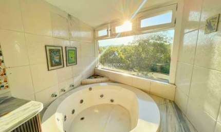 Casa em condomínio fechado com 3 quartos à venda na Rua Tocantins, 937, Lomba do Pinheiro, Porto Alegre, 291 m2 por R$ 1.588.900