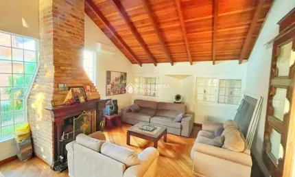 Casa em condomínio fechado com 3 quartos à venda na Rua Tocantins, 937, Lomba do Pinheiro, Porto Alegre, 291 m2 por R$ 1.588.900