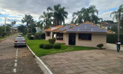 Casa em condomínio fechado com 3 quartos à venda na Estrada Capitão Gentil Machado de Godoy, 4500, Vila Elsa, Viamão, 250 m2 por R$ 960.000